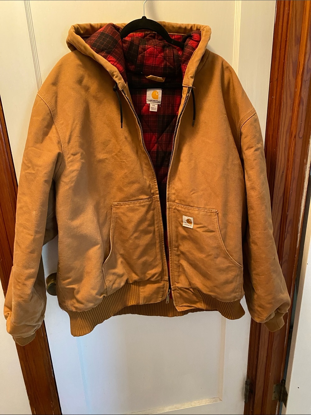 Carhartt Brown Hooded Duck Jacket with Red Plaid Lining. Great condition!
